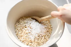 Mixing together the dry ingredients for baked oatmeal.