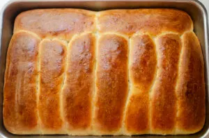 The hotdog buns baked in a 9x13-inch pan.