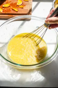 Mixing together the wet ingredients.