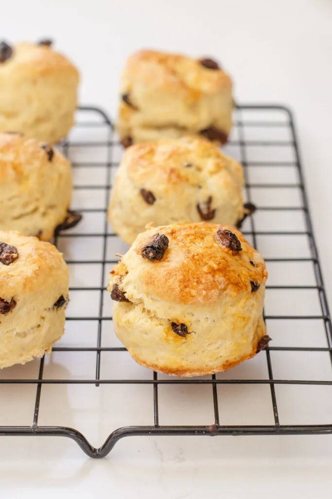 Irish Buttermilk Scones on a black wire cooling rack.