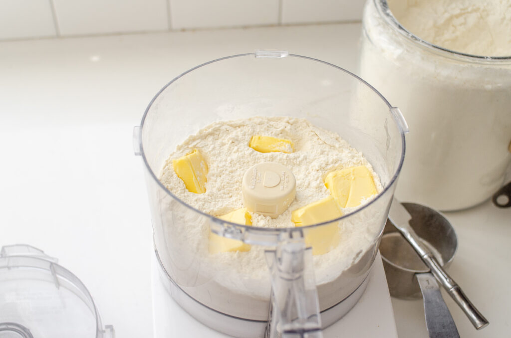 Butter pieces scattered in the dry ingredients.