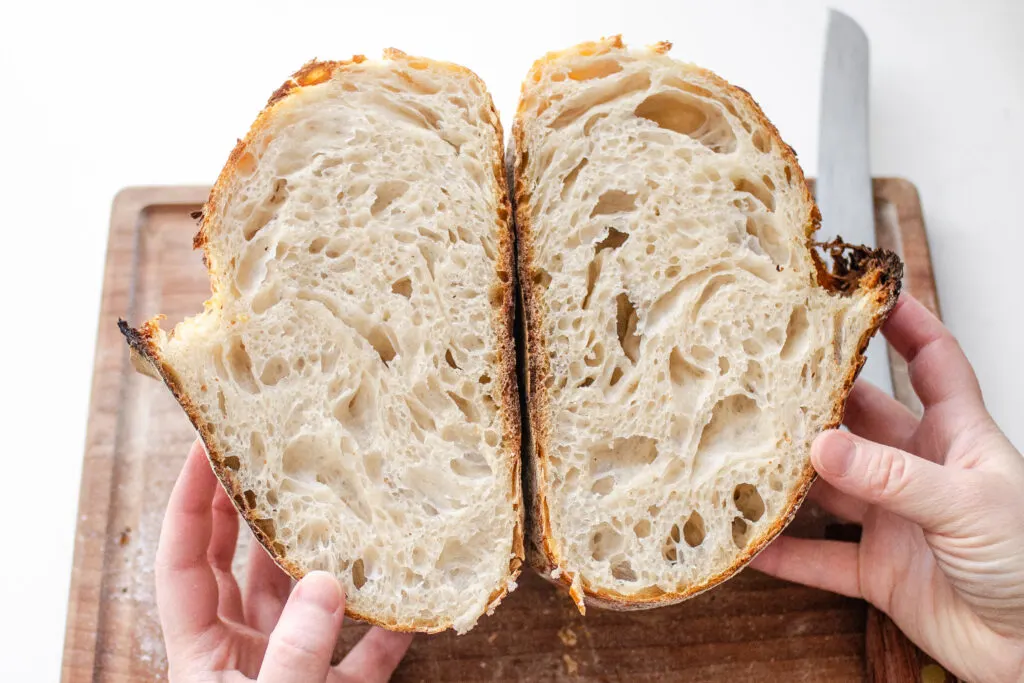 A crumb shot of a sourdough batard loaf.