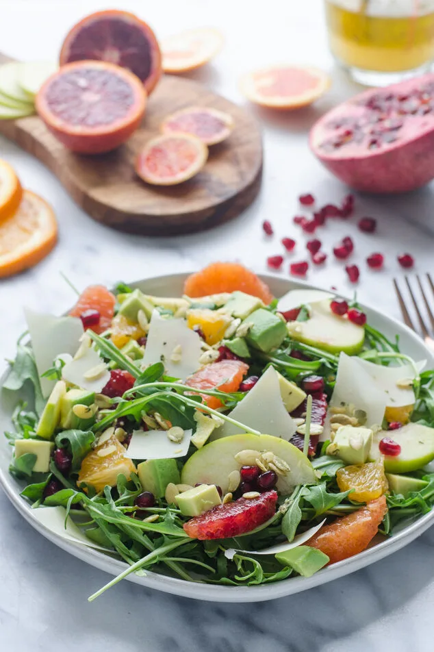 Winter Salad with Arugula, Avocado, Pomegranate, Blood Orange, and Apple