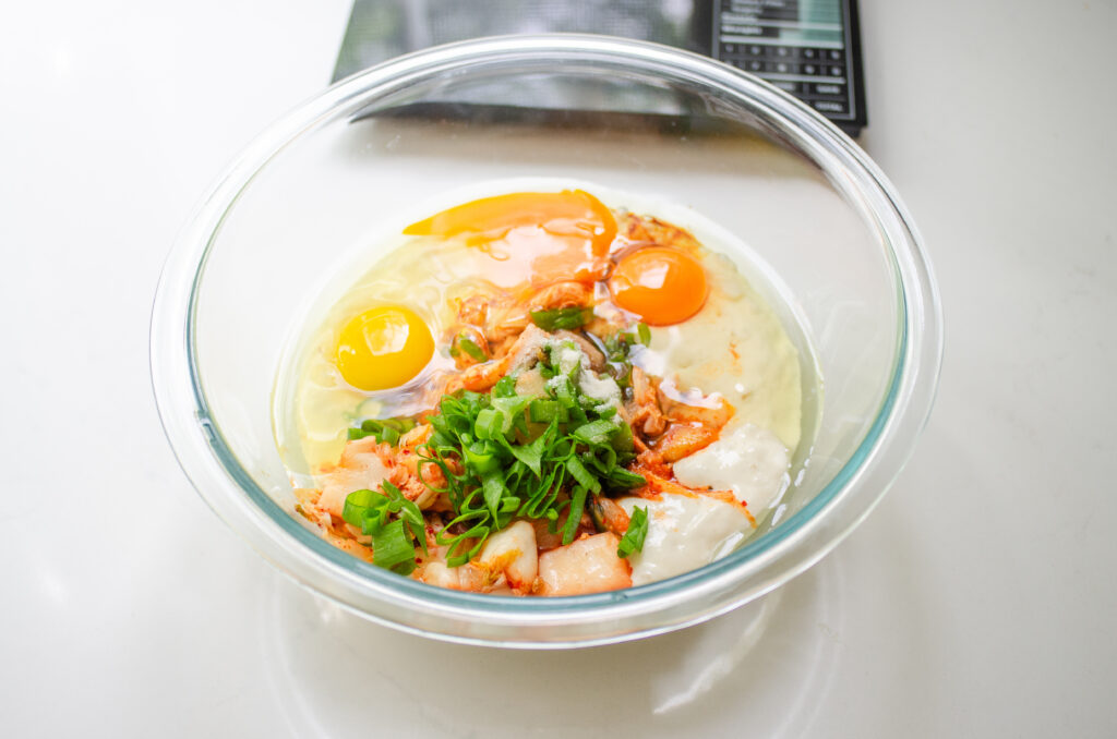 All of the ingredients for the pancake in the bowl. 