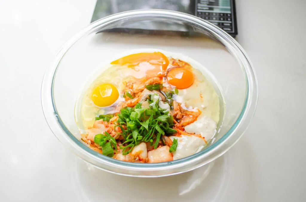 All of the ingredients for the pancake in the bowl.