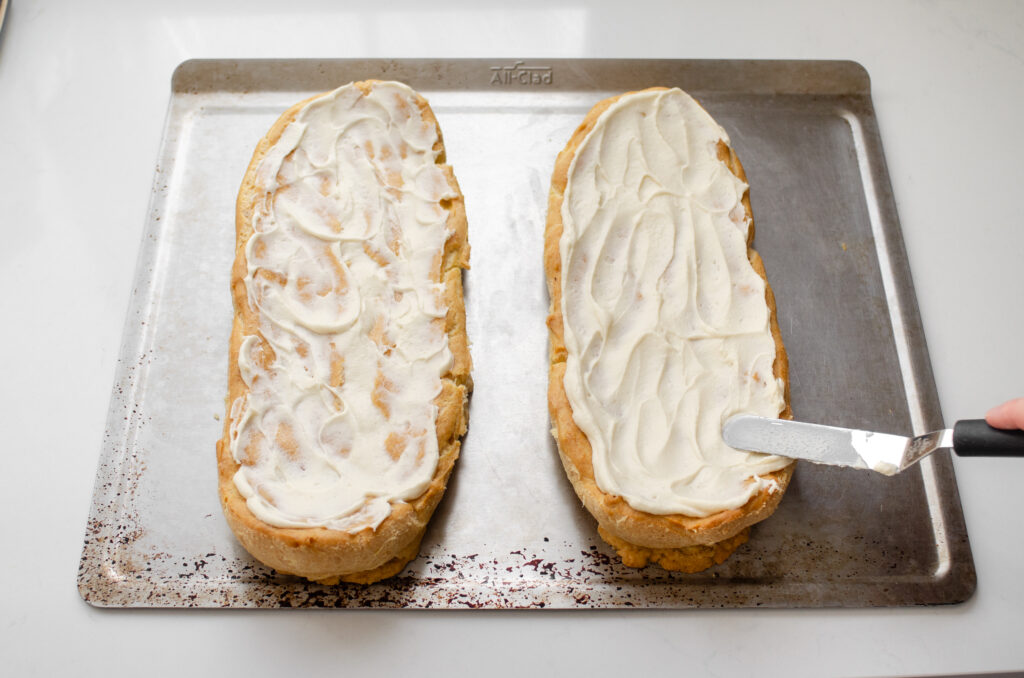 Spreading the icing on top of the choux style layer.