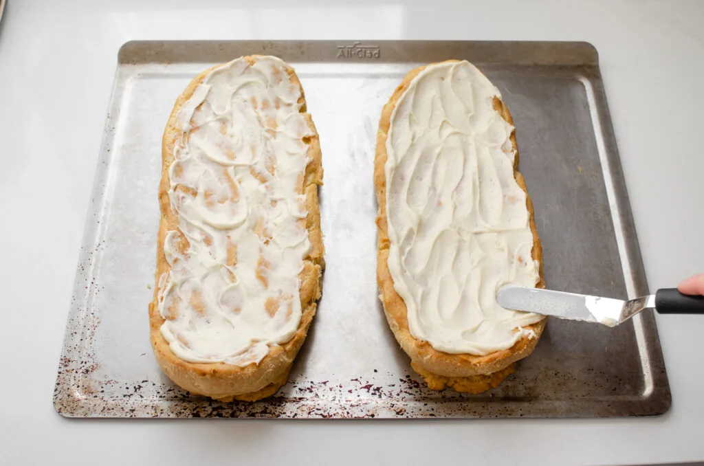 Spreading the icing on top of the choux style layer.