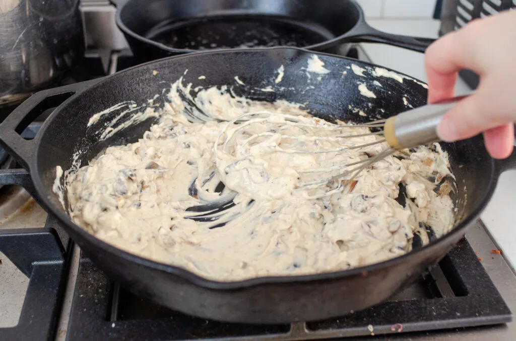 The cream cheese fully mixed in to the mushroom mixture.