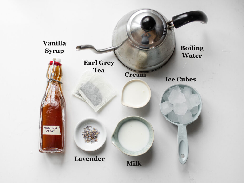 All of the ingredients needed for a traditional iced London Fog latte.