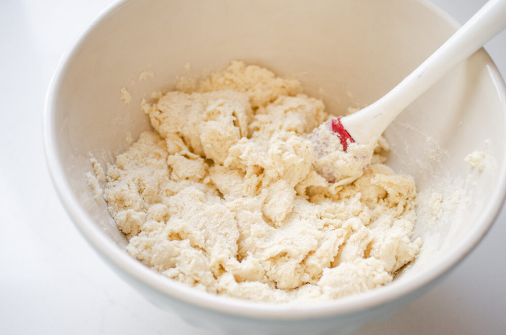The dough coming together in the bowl.