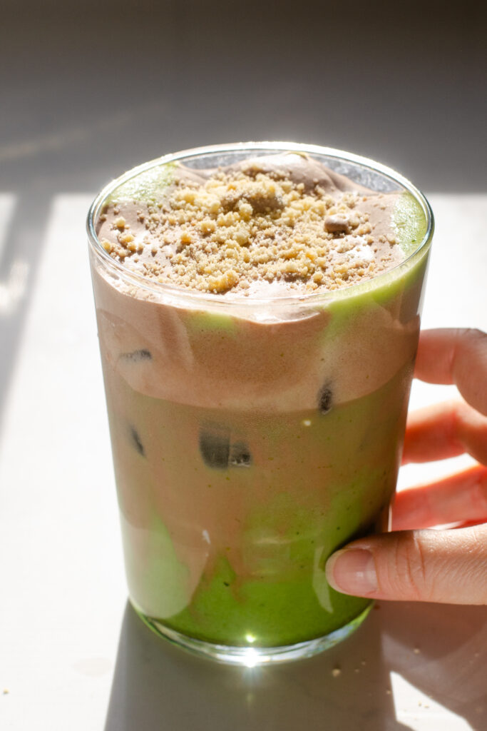 The finished "natural" from scratch version of the iced Dubai chocolate match latte (Starbucks copycat)